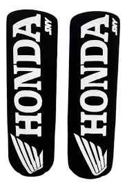 CUBRE AMORTIGUADOR 125/150CC / NEGRO / (PALABRA HONDA)